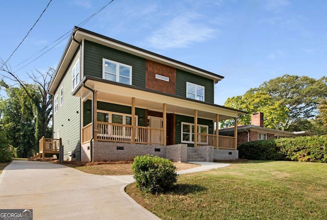 view of front facade featuring a porch and a front lawn