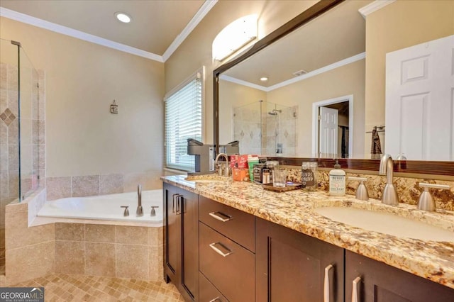 bathroom with vanity, independent shower and bath, and crown molding