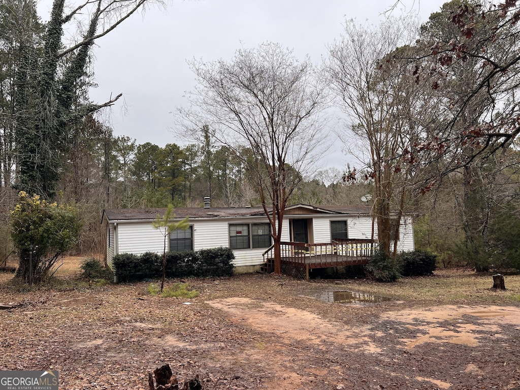 view of front of home with a deck