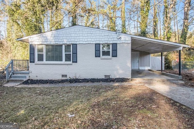 view of front of house with a carport