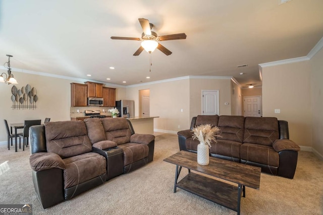 living room with light colored carpet, crown molding, and ceiling fan with notable chandelier