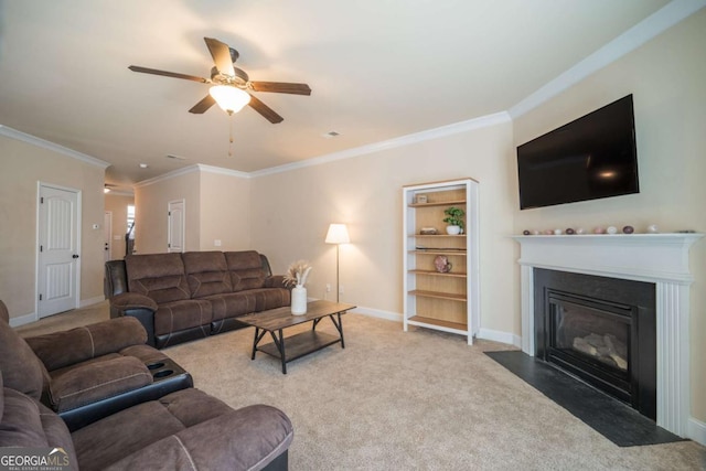 carpeted living room featuring ceiling fan and crown molding