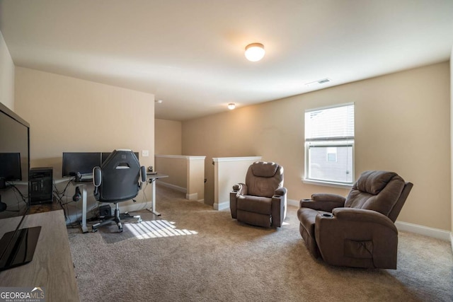 office space with light colored carpet