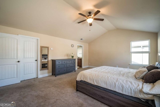 carpeted bedroom with ceiling fan, a closet, and lofted ceiling