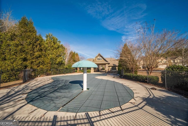 view of swimming pool featuring a gazebo and a patio area