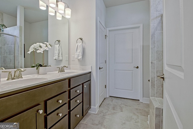 bathroom with a shower and vanity