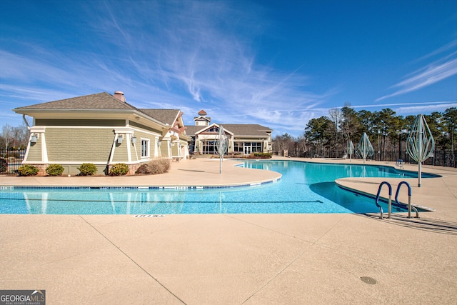 view of swimming pool featuring a patio