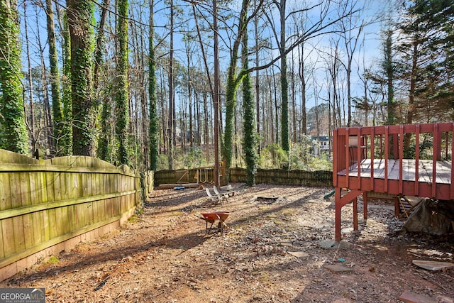 view of yard featuring a deck