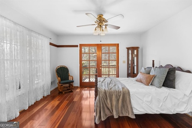 bedroom featuring french doors, ceiling fan, access to outside, and dark hardwood / wood-style floors