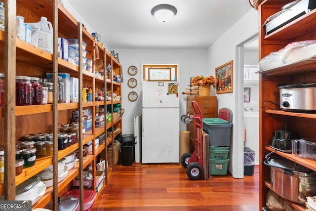 storage area featuring washer / dryer