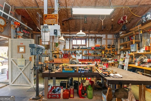 garage featuring a workshop area