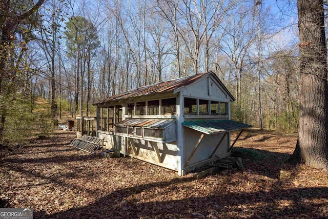 exterior space with an outbuilding