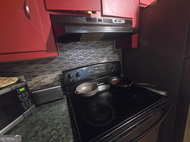 kitchen with black range with electric stovetop and decorative backsplash