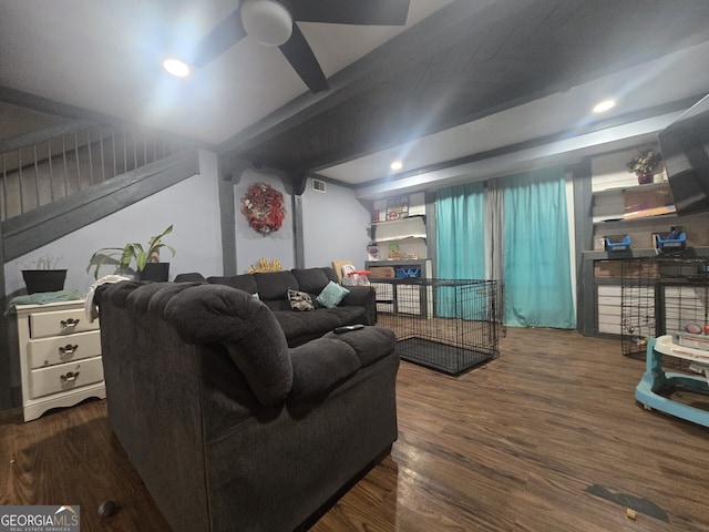 living room with ceiling fan and dark hardwood / wood-style floors