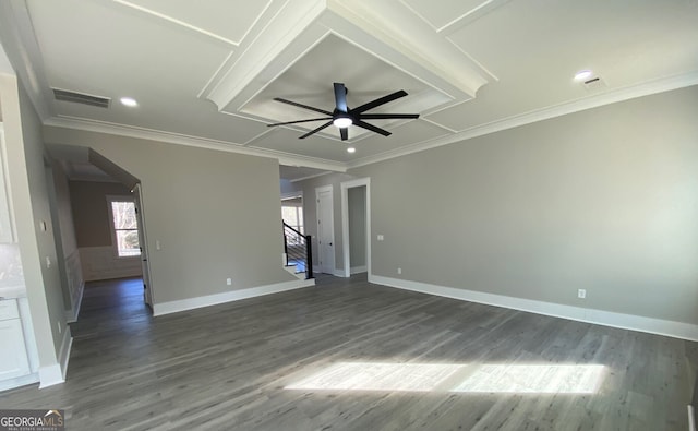 unfurnished room featuring ceiling fan, ornamental molding, and dark wood-type flooring