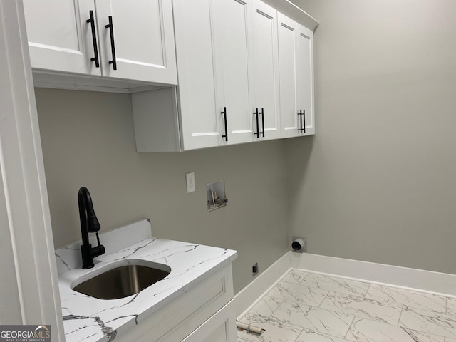 clothes washing area featuring sink, cabinets, hookup for an electric dryer, and washer hookup