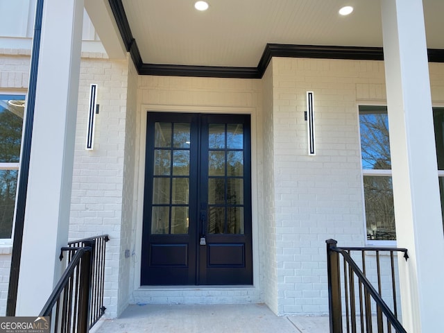 view of exterior entry featuring french doors