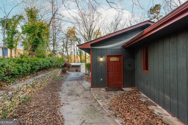 doorway to property featuring a patio area