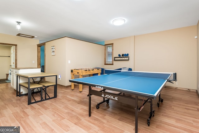 recreation room featuring light hardwood / wood-style flooring