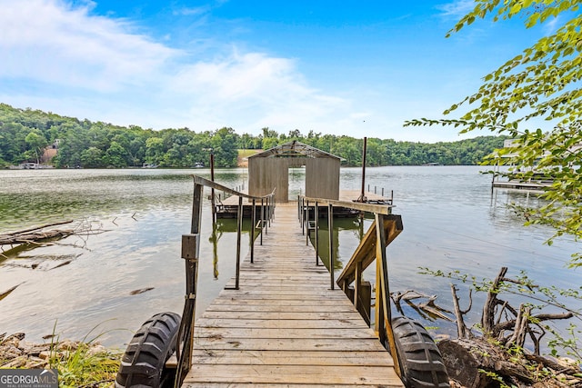 dock area featuring a water view