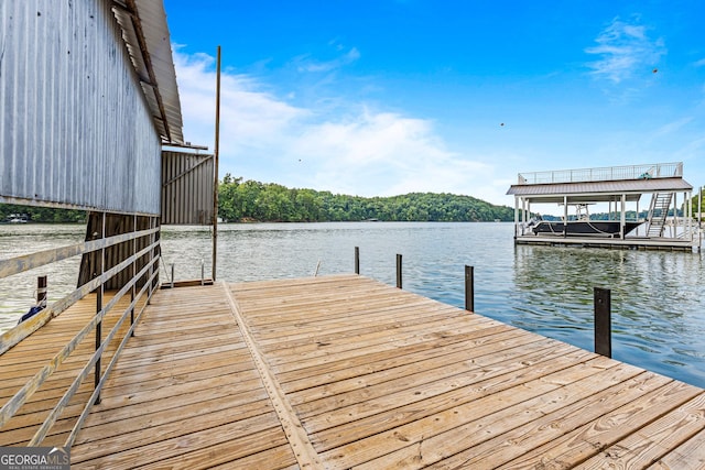 view of dock featuring a water view