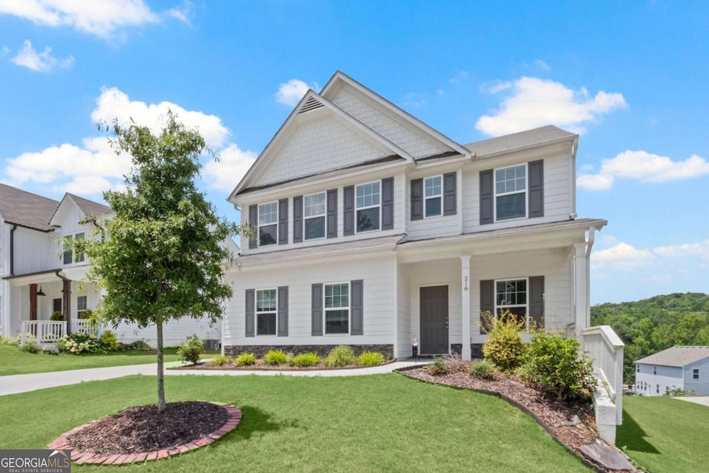 view of front of house with a front lawn