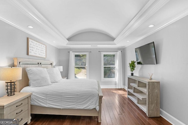 bedroom with crown molding and dark wood-type flooring