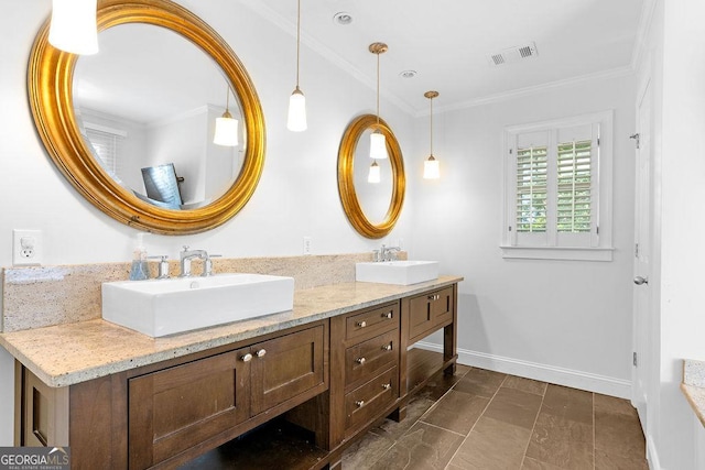 bathroom with crown molding and vanity