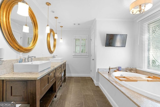 bathroom featuring vanity, tile patterned floors, crown molding, and a bath