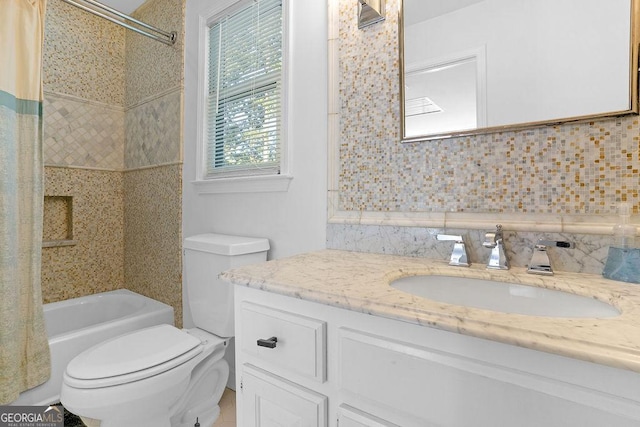 full bathroom featuring shower / bath combination with curtain, backsplash, vanity, and toilet