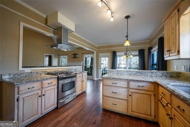 kitchen with crown molding, an inviting chandelier, gas range, and light stone countertops