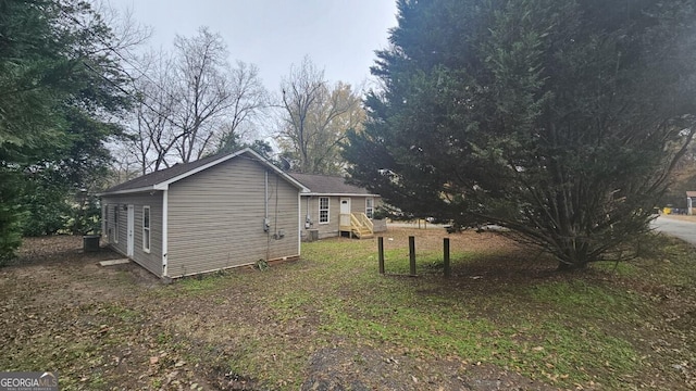 view of property exterior featuring a yard