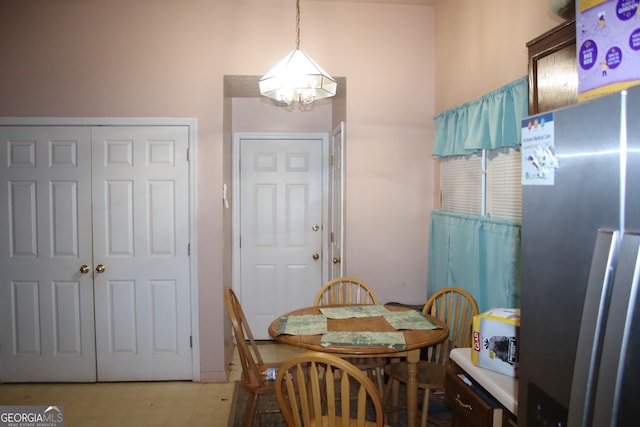 dining area featuring a chandelier