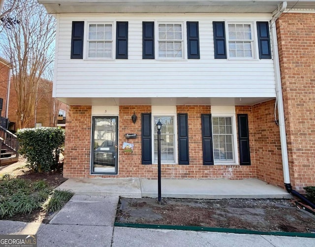 view of front of home with a patio area