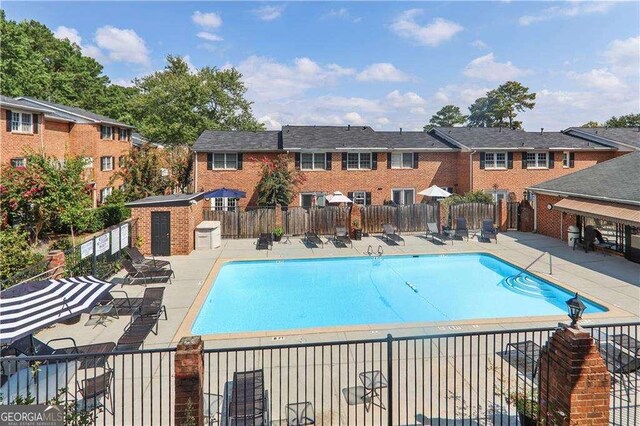 view of pool with a patio area