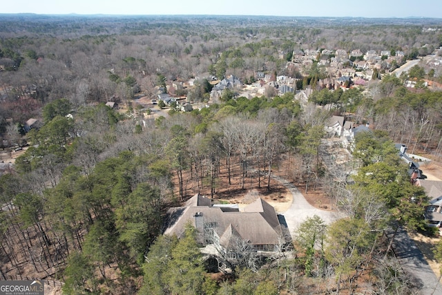 bird's eye view with a forest view