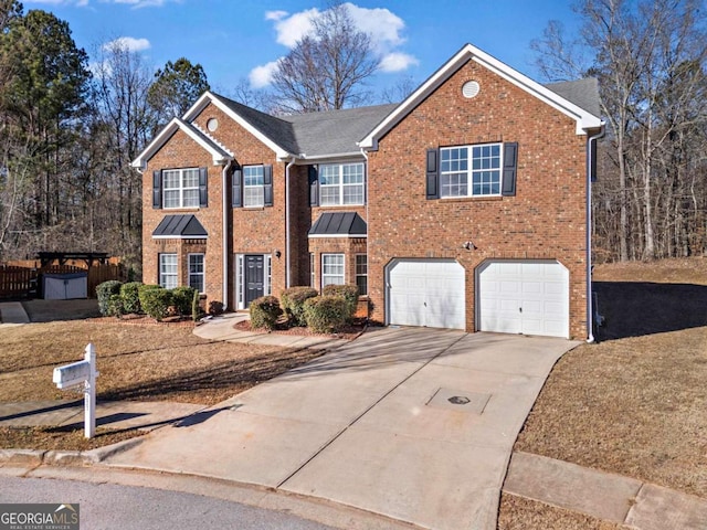 view of front of property featuring a garage