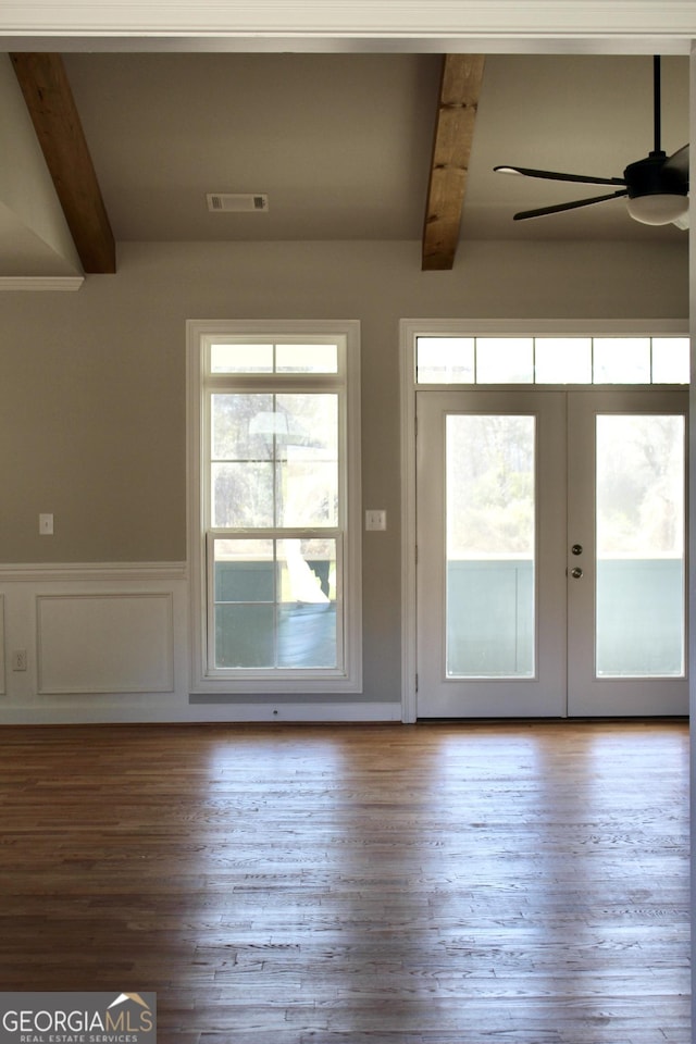 doorway featuring beam ceiling, ceiling fan, french doors, and hardwood / wood-style floors