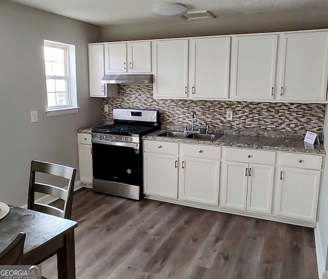 kitchen featuring white cabinetry, gas range, and sink