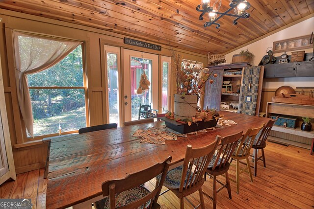 dining room featuring an inviting chandelier and wood-type flooring