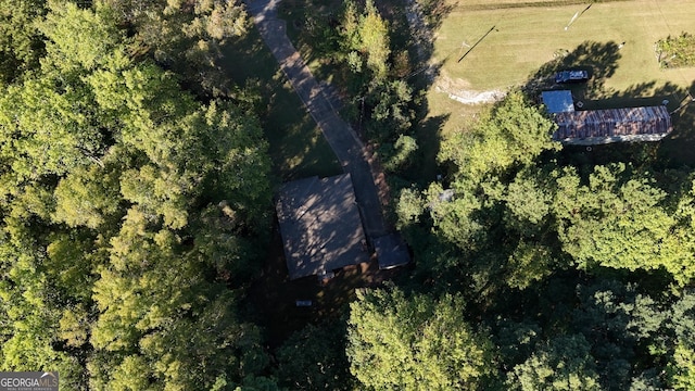 birds eye view of property featuring a rural view