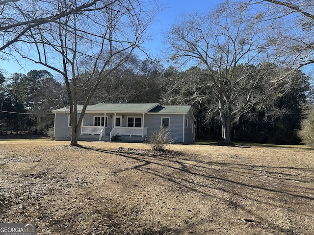 view of front of home featuring covered porch