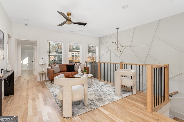 office area featuring ceiling fan and hardwood / wood-style floors