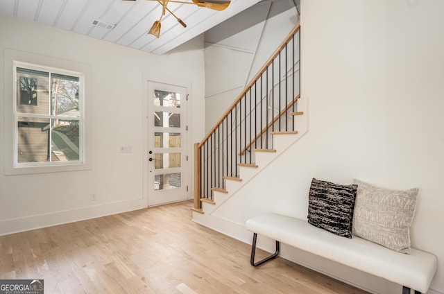 entrance foyer featuring an inviting chandelier and light wood-type flooring