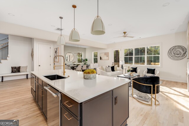 dining space with a chandelier and light hardwood / wood-style flooring