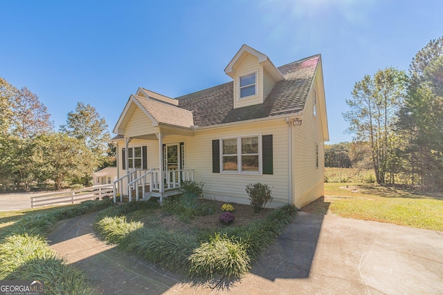 view of new england style home