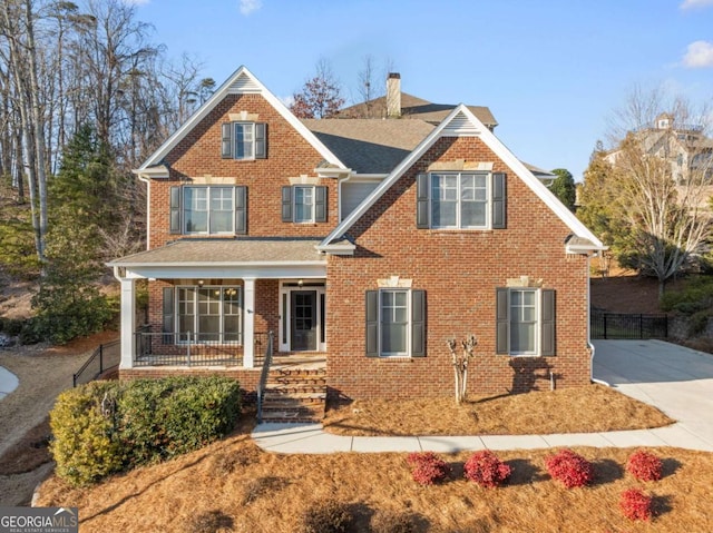 view of front of property featuring covered porch