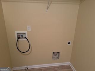 laundry room featuring hookup for an electric dryer and hookup for a washing machine