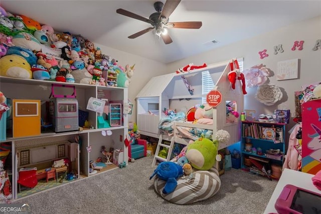 game room with carpet and ceiling fan