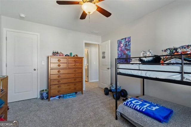 carpeted bedroom featuring ceiling fan